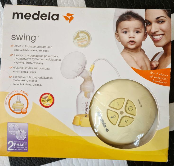 Kultowy laktator elektryczny Medela Swing + woreczki na pokarm