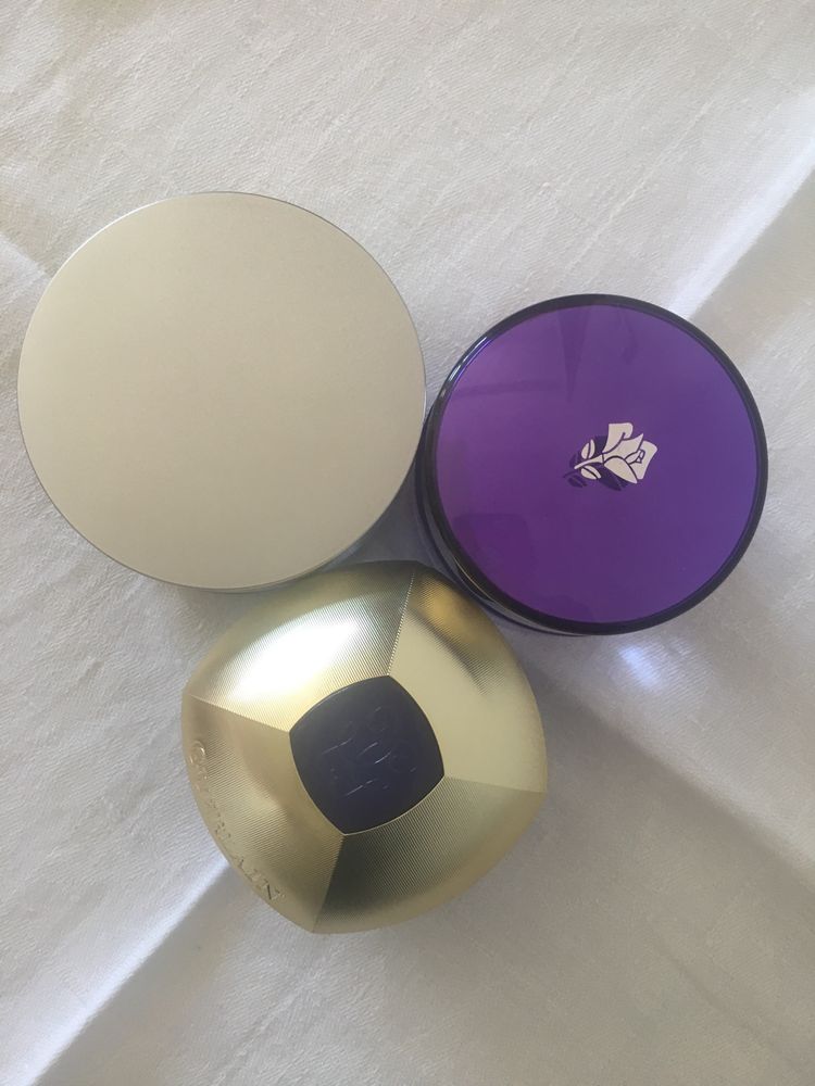 Пустые баночки от крема  Lancome .