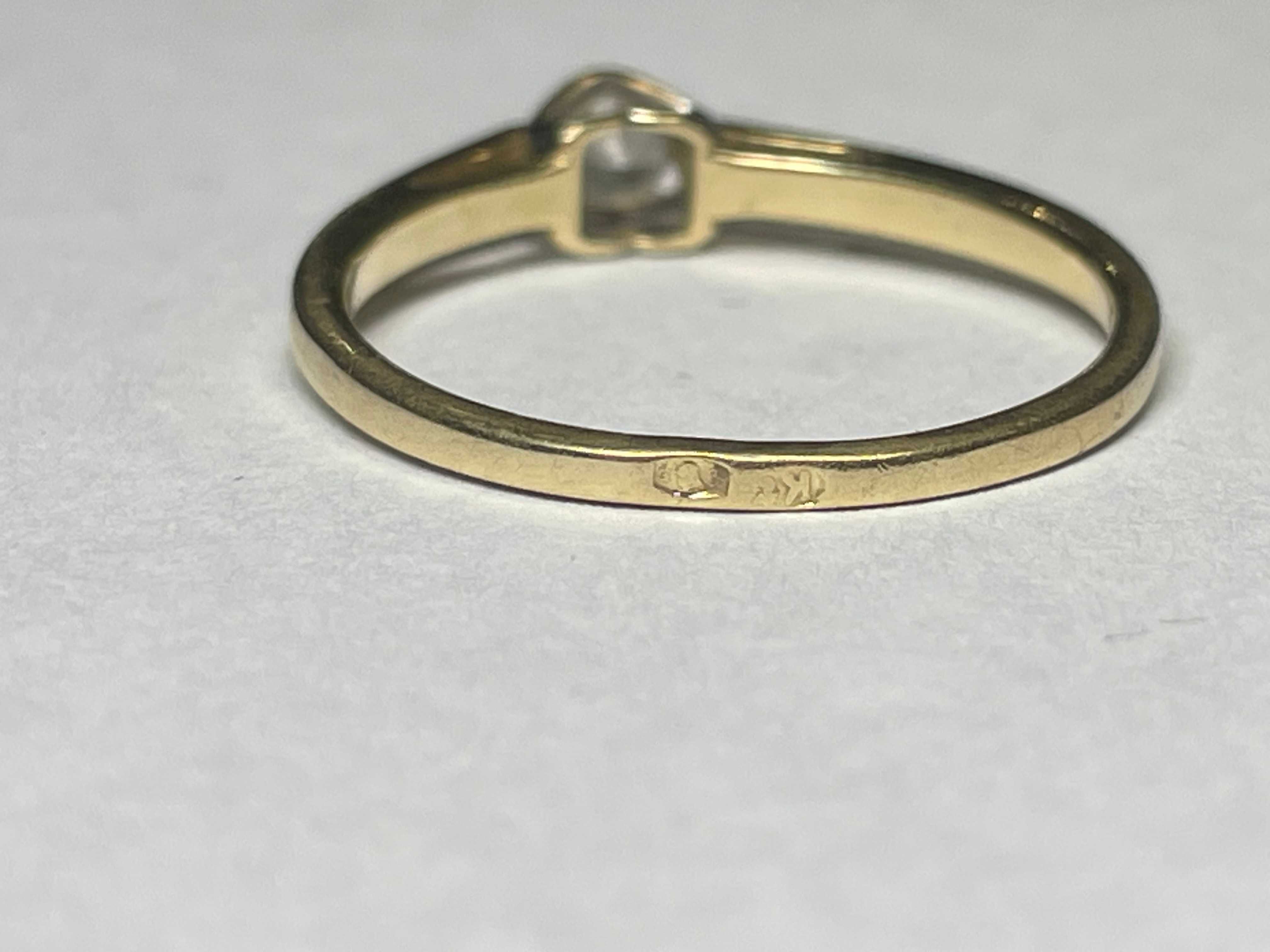 Złoty pierścionek zaręczynowy z diamentem 14kt 1,65 gran 0,15ct r.14