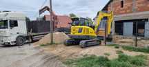 Budowa zbiorników  koparka czyszczenie rowów stawów wynajem