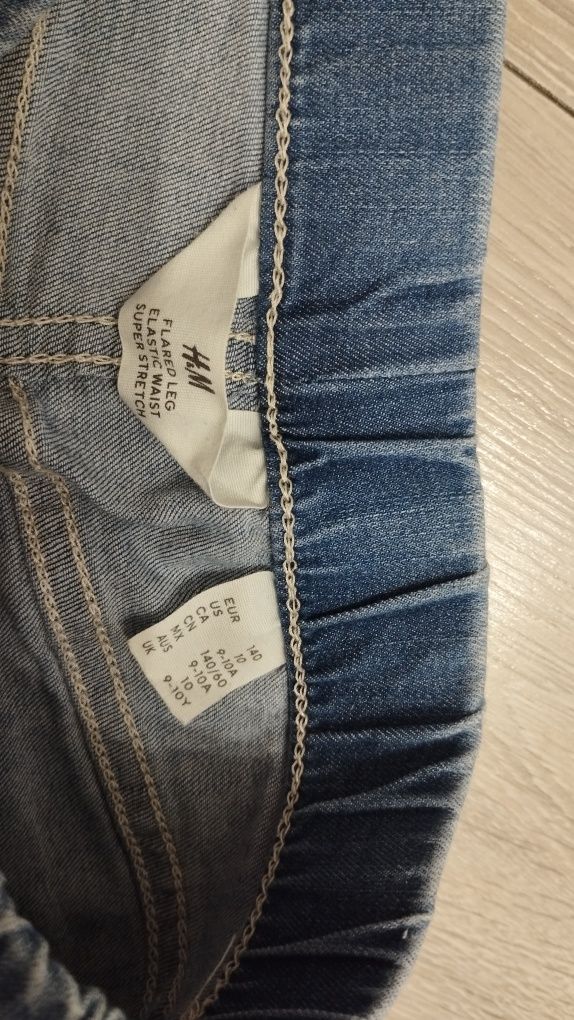 Spodnie dziewczęce hm 140 jednorożec