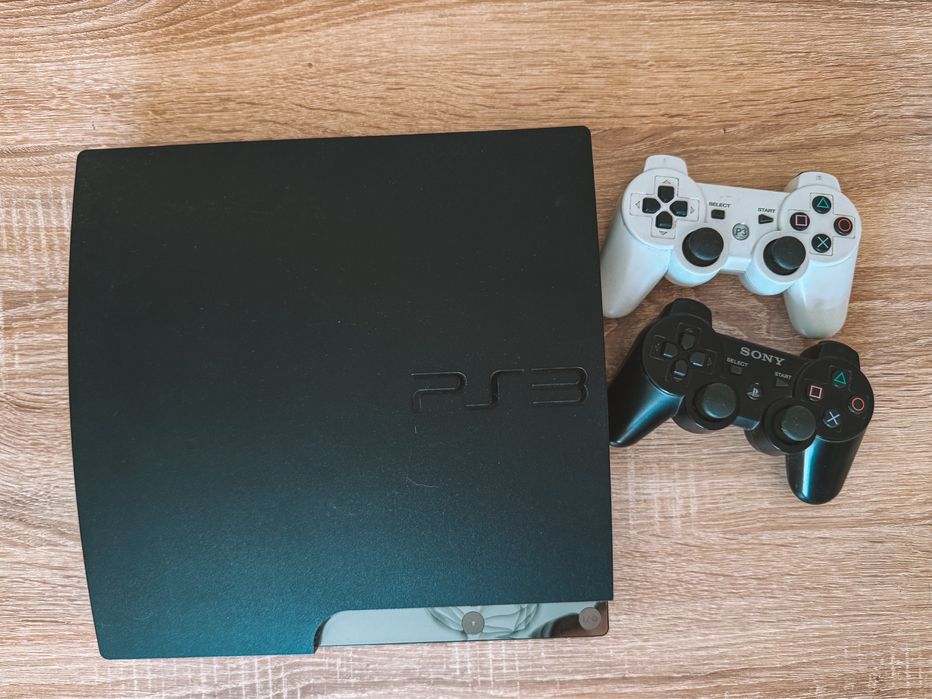 Playstation 3 Slim + 2 comandos + Jogos