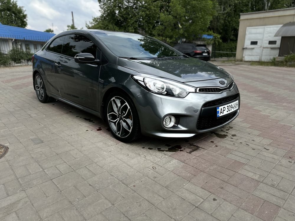 KIA Cerato Koup 1.6 T-GDi ( 204 л.с. ) 2014 год