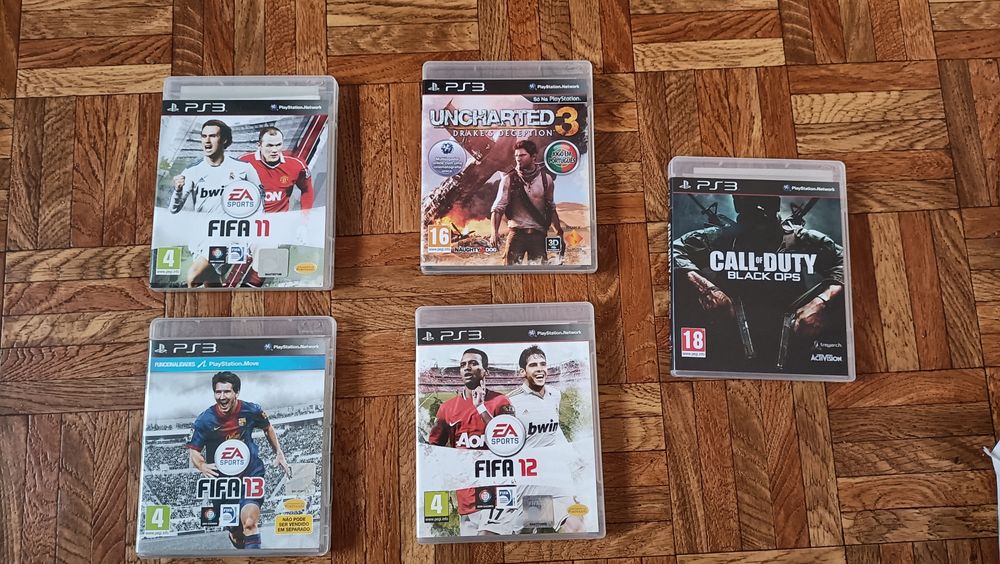 Playstation 3 + comandos move + 2 jogos sports champions + 5 jogos Ps3
