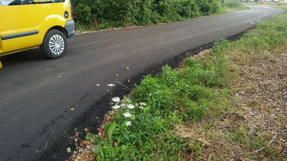 Asfaltowanie, naprwa i budowa dróg,gorący asfalt.