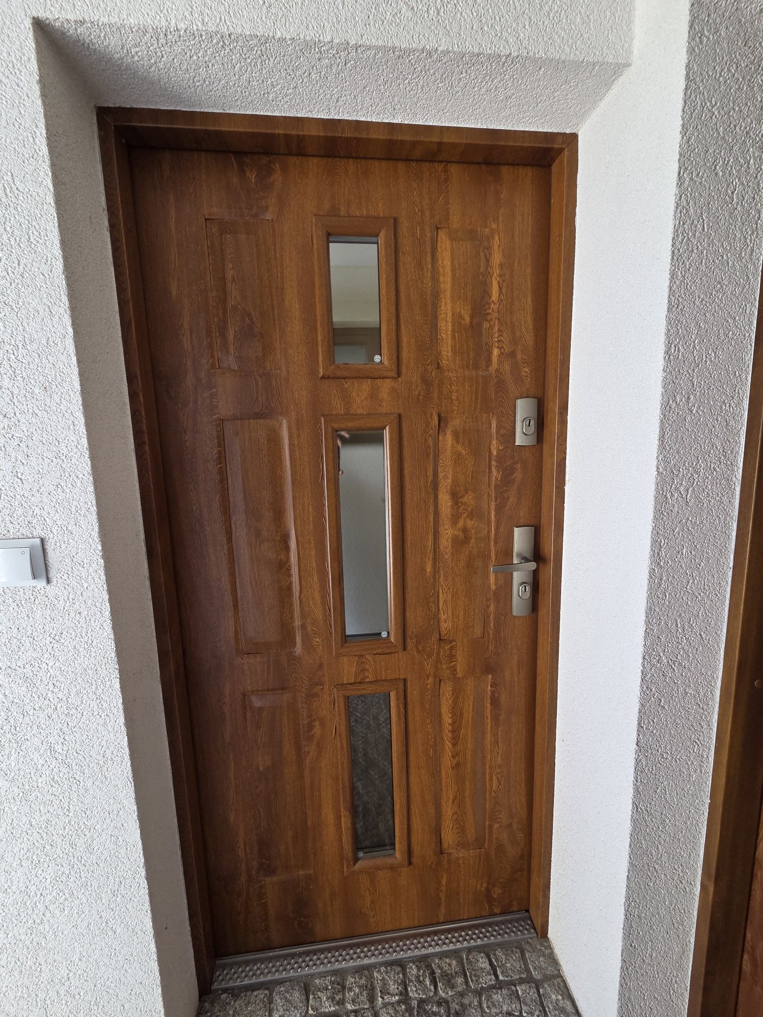 Drzwi zewnętrzne antywłamaniowe Kmt 100x205 cm kolor złoty dąb
