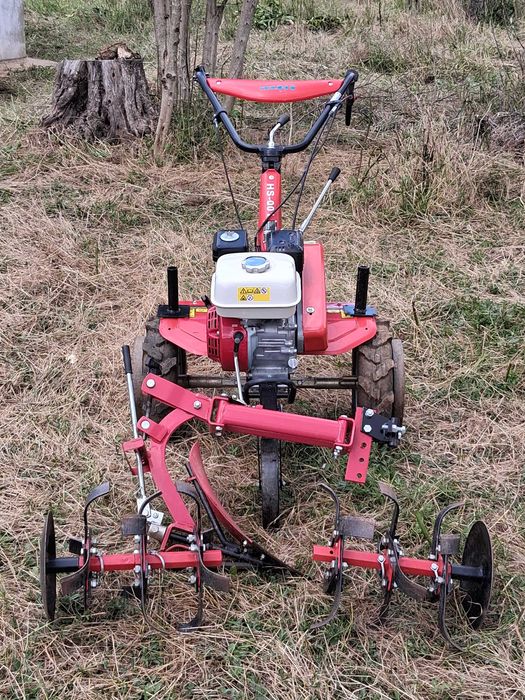 Moto enchada com motor honda, como nova.