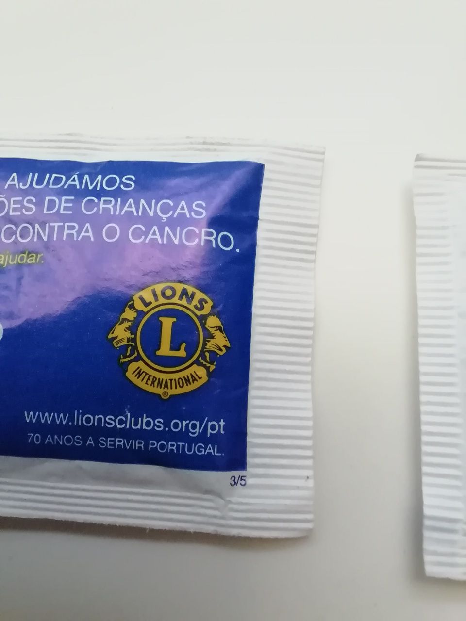 Pacotes de açúcar Delta Lionsclubs