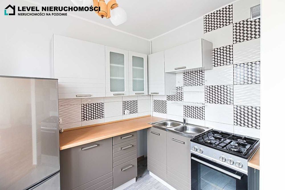 Kawalerka z balkonem w centrum.