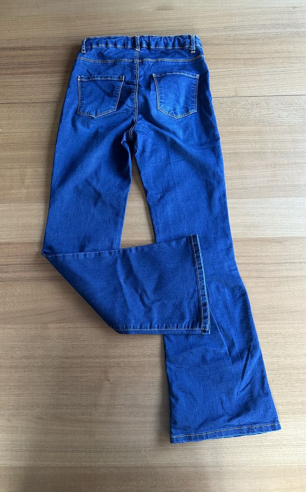 Spodnie jeansy jeansowe flare dzwony 152 cm j.nowe Lc Waikiki Wwa