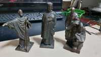 Три бронзовые статуэтки.