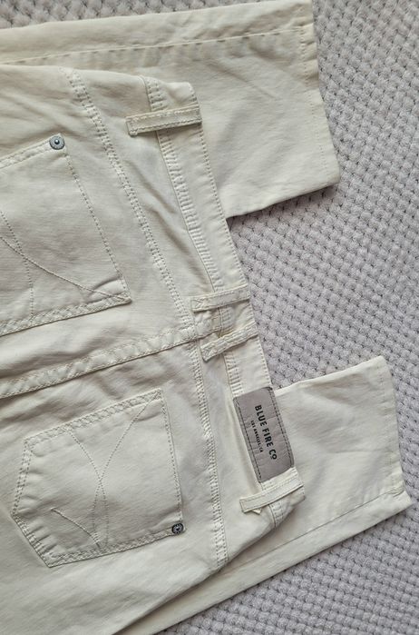 Nowe kremowe spodnie damskie jeansowe dżinsowe bawełna rozm.W29L34