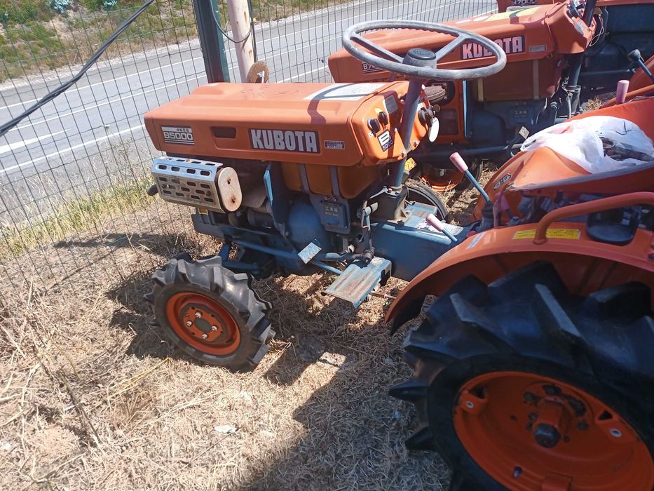 trator kubota com frese