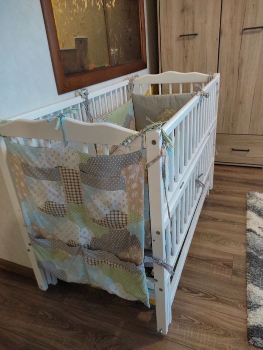 Дитяче ліжечко з матрацом та бортиками