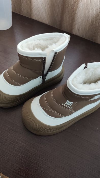 Теплі зимові чоботи