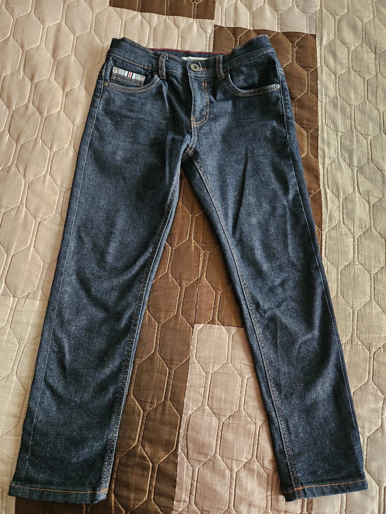 Spodni jeansowe Reserved 134r.