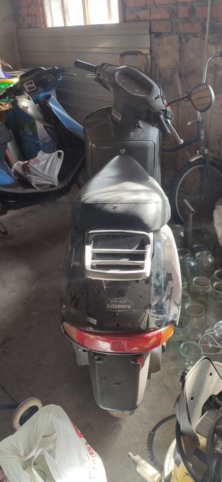 Мопед хонда леад