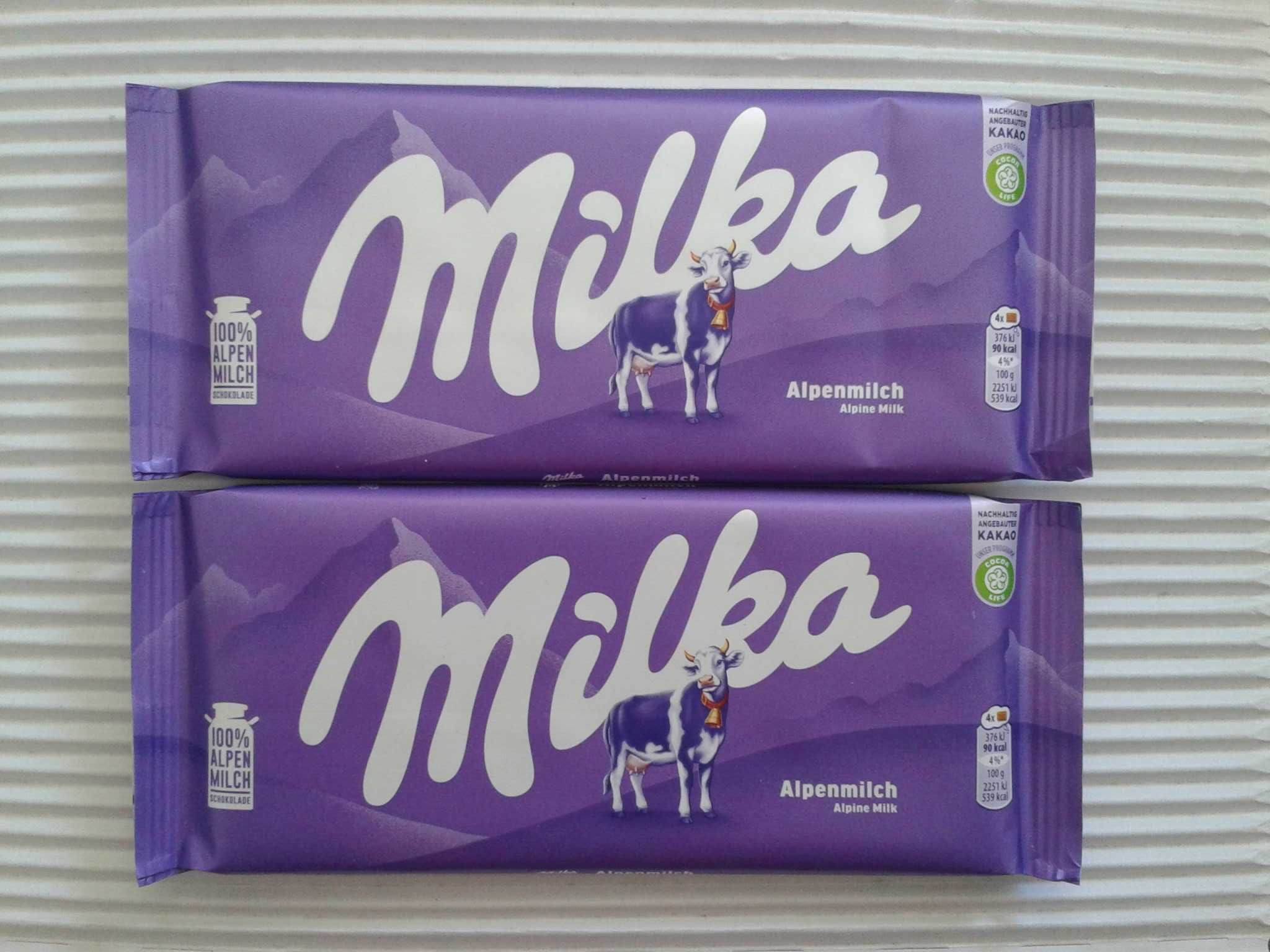MILKA Czekolada mleczna Alpenmilch z pastą z orzechów z Niemiec 100gx2