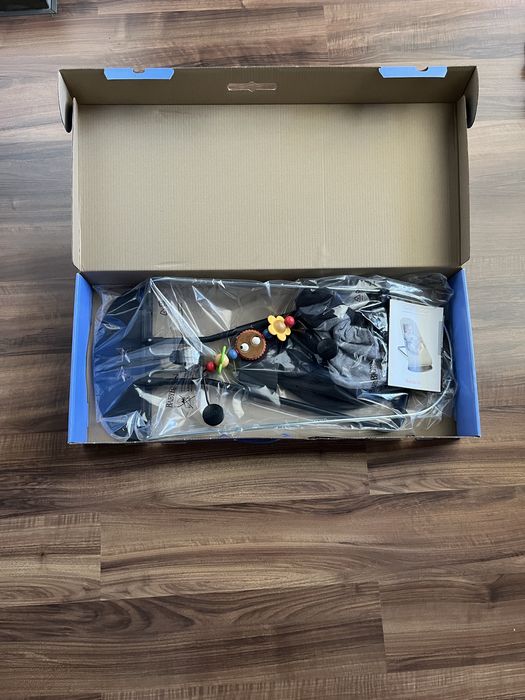 Espreguiçadeira de bébé Babybjorn + brinquedo