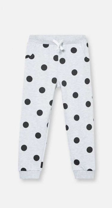 Joggery spodnie w kropki grochy 128