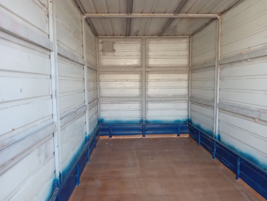 Бортовий тентований причіп