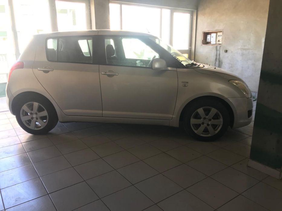 Suzuki Swift 1.3 – 2009 | 75cv | 5 portas | Manual | Cinzento