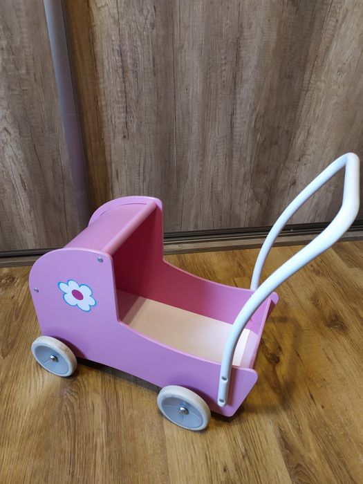 Drewniany wózek dla lalek, pchacz. Różowy